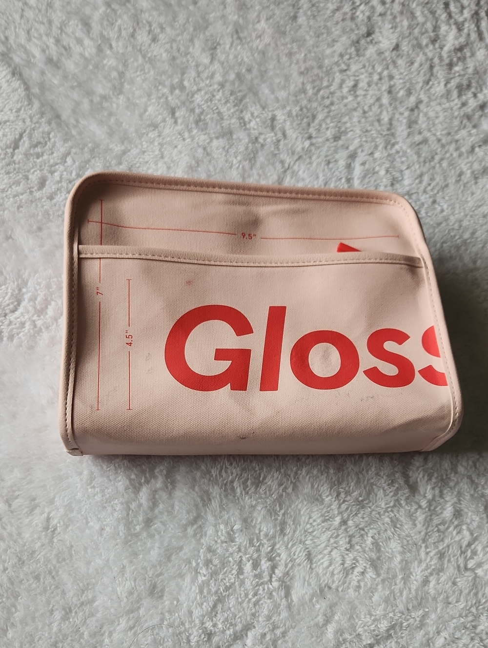 Glossier Peach-Pink Cosmetic Pouch with Red Logo